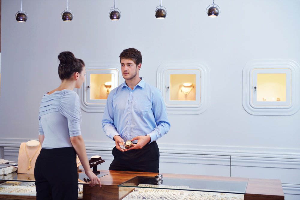 Salesperson learning how to sell jewelry securely